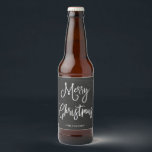Merry Christmas | Handwritten Script on Chalkboard Beer Bottle Label<br><div class="desc">These simple and trendy holiday labels say "Merry Christmas" in rustic,  white handwritten script on a black,  chalkboard look background.</div>