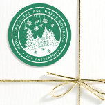 Merry Christmas Happy Holidays Winter Personalized Classic Round Sticker<br><div class="desc">Merry Christmas Happy Holidays Winter Personalized Name Stickers Labels features the text "Merry Christmas and Happy Holidays" in modern white script on a green background and personalized with your name surrounding a home with Christmas trees and snowflakes. Perfect for Christmas party favours and Holiday gifts or in the office for...</div>