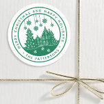 Merry Christmas Happy Holidays Winter Personalized Classic Round Sticker<br><div class="desc">Merry Christmas Happy Holidays Winter Personalized Name Stickers Labels features the text "Merry Christmas and Happy Holidays" in modern green script and personalized with your name surrounding a home with Christmas trees and snowflakes. Perfect for Christmas party favours and Holiday gifts or in the office for products or mail. Designed...</div>