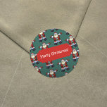 Merry Christmas! Happy Santa Father Xmas Pattern Classic Round Sticker<br><div class="desc">Seal your Christmas wrapping or envelopes in style with these stickers; featuring a busy repeat of Father Christmas doing a star jump. Use "Personalize this template" to change the "Merry Christmas!" text if desired. Drawn in a retro, pixel art style, a traditional Santa Claus decked in red suit and hat...</div>
