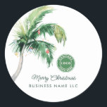 Merry Christmas Palm Tree Coastal Business Logo Classic Round Sticker<br><div class="desc">A modern stylish holiday flat greeting card with modern and handwritten script typography featuring a decorated Palm Tree. Easily customize this card by clicking the "Personalize" button. Whether you're expressing gratitude, extending best wishes, or simply sharing the spirit of the season, our Custom Palm Tree Business Christmas Greetings Card is...</div>