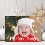 Merry Christmas Photo White Script Magnet Card<br><div class="desc">Elegant Merry Christmas photo magnet card with beautiful cursive script in white. These modern holiday baby photograph horizontal magnets feature gorgeous typography and your custom text over the full bleed picture in white at the top.</div>