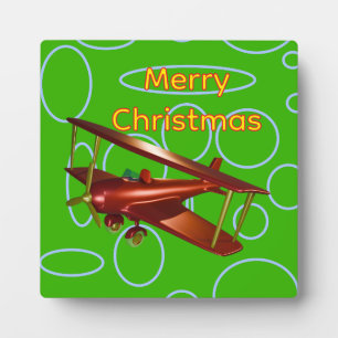 Merry Christmas Red Bi-plane on Green Circles Plaque