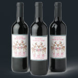 Merry Christmas Reindeer Personalized Name Wine Label<br><div class="desc">Merry Christmas Reindeer Personalized Name Festive Party Personalized Name Wine Labels Stickers features festive reindeer with pink bows and floral accents with the text "Merry Christmas" in modern pink calligraphy script typography with your personalized name. Perfect personalized gift for Christmas and the holidays for family and friends. Designed by ©2024...</div>