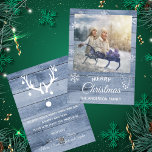 Merry Christmas rustic blue wood photo card<br><div class="desc">On front: A rustic Winter blue wooden wall as background. With white snowflakes, foliage and berries as decor. With a template for your family photo and family name. With the text: Merry Christmas written with a hand-lettered style script. White letters. Back: the wooden wall and a modern, funny, abstract image...</div>