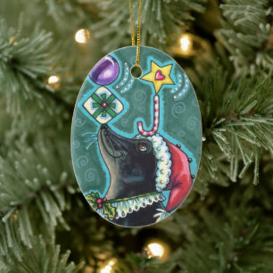 MERRY CHRISTMAS SEAL BALANCING GIFTS & CANDY CANE CERAMIC ORNAMENT