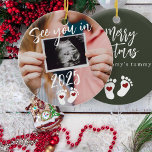 Merry Christmas see you in 2025 photo pregnancy Ceramic Ornament<br><div class="desc">Modern funny see you in 2025 script,  footprints,  and red hearts new baby expecting parents keepsake Merry Christmas from mommy's tummy dark green tree ornament with your custom ultrasound photo.</div>