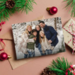 Merry Christmas simple script four photo green Holiday Card<br><div class="desc">This simple Merry Christmas photo card is the perfect way to send holiday cheer to friends and family. With its fun script "Merry Christmas" with a hand-lettered look and customizable text, this holiday card works well with a variety of photos. The back features a festive trendy green background and three...</div>