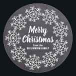 Merry Christmas Snowflake Chalkboard Personalized Classic Round Sticker<br><div class="desc">A large snowflake wreath creates a festive border on this chalkboard Christmas sticker. Merry Christmas is written in a bold white script font. Your name is just below in a classic sans serif white font. Easy-to-use template. Quickly add your own details. Use it to seal your Christmas card envelopes or...</div>