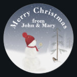 Merry Christmas Snowman With Gold Star Classic Round Sticker<br><div class="desc">Cute snowman in snowflakes with a gold star for an old pine tree in winter woods under the moon.
Greetings and name can be edited.</div>
