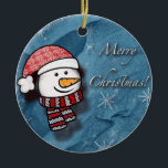 Merry Christmas, snowman with knitted clothes Ceramic Ornament<br><div class="desc">A beautiful little snowman wearing white and red knitted clothes on a blue paper . Perfect to wish merry Christmas to the little ones.</div>