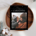 Merry Christmas Typography Black Photo Holiday Card<br><div class="desc">Elegant and modern holiday card featuring a typography text that says "Merry Christmas" with a picture. Add another photo on the back along with your message. Background is black.</div>
