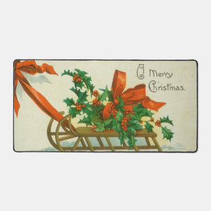 Merry Christmas - vintage postcard, sled and holly Desk Mat