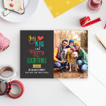 Merry Everything Colourful Typography Photo Holiday Card<br><div class="desc">Simple and stylish Christmas photo card greeting features the phrase "Joy, Love, Peace and Merry Everything" in bold colours and modern type. Colourful snowflakes dress up the back side of the card. Personalize with your photo (portrait format) and with custom text. Charcoal grey / soft black background with golden yellow,...</div>