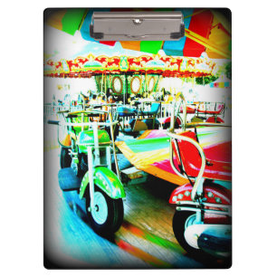 Merry Go Round Motor bikes at the Carnival Clipboard