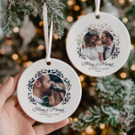 Merry & Married Cutout Frame 2-Photo 1st Christmas Ceramic Ornament<br><div class="desc">This personalized “Merry & Married” wedding photo ornament is a romantic way to celebrate a couple’s first Christmas together as newlyweds. This double-sided design features a festive wreath-style cutout of delicate leaves, stars, and modern accents framing your favourite wedding photo, creating a holiday keepsake full of love and joy. Below...</div>