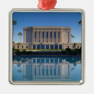 Mesa temple reflecting in a blue pool metal ornament