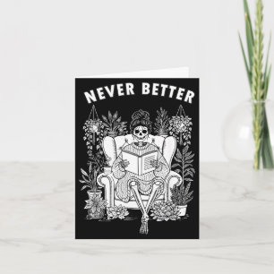 Messy bun skeleton reading book coffee better card