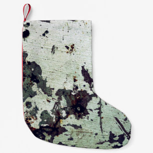 Metal texture with scratches and cracksabstract, a small christmas stocking