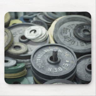 Metal weights scattered around mousepad