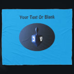 Metallic Blue Dreidel Fleece Blanket<br><div class="desc">A modernistic, metallic blue dreidel against a dark, night-like background. Two of the Hebrew letters found on a dreidel, nun and shin, glow brightly. Add your own text.</div>