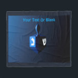 Metallic Blue Dreidel Fleece Blanket<br><div class="desc">A modernistic, metallic blue dreidel against a dark, night-like background. Two of the Hebrew letters found on a dreidel, nun and shin, glow brightly. Add your own text.</div>