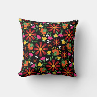 Mexican flower embroidery on black throw pillow