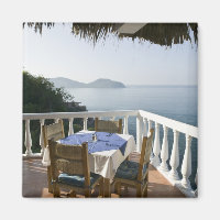 Mexico, Guerrero, Zihuatanejo. Cafe Table over