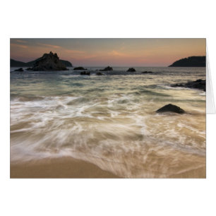 Mexico, Guerrero, Zihuatanejo. Surf along a