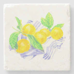 Meyer lemons on kitchen towel stone coaster