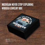 Michigan Never Stop Exploring Wooden Jewellery Box<br><div class="desc">Store your precious keepsakes and jewellery in this beautifully crafted wooden jewellery box featuring a stunning design that celebrates the spirit of Michigan adventure. The lid showcases an artistic depiction of the Porcupine Mountains and a motivational slogan, "Take The Long Way Home - Never Stop Exploring." This unique design captures...</div>