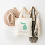 Michigan Wedding Welcome Tote Bag<br><div class="desc">Welcome out of town wedding guests with a bag full of snacks and treats personalized with the state where you're getting married and the bride and groom's names and wedding date. Click Customize It to move the heart to show any city or location on the state map. Use the design...</div>