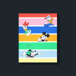 Mickey & Friends Pop-Out Color Striped Graphic Canvas Print<br><div class="desc">Add a pop of joy to your day with this vibrant Mickey & Friends "Peek-a-Boo" design! Featuring Mickey Mouse, Minnie, Donald, and Daisy, this high-energy graphic showcases your favorite characters popping out from behind bold, multi-colored stripes. With its saturated color palette and playful character expressions, this design is all about...</div>
