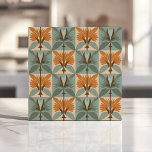 Mid-Century Floral Pattern in Orange and Blue Tile<br><div class="desc">Add a bold retro flair to your home with this mid-century modern floral tile design. Featuring vibrant orange and blue abstract floral motifs arranged in a symmetrical grid on a soft cream background, this tile exudes charm and personality. Ideal for backsplashes, accent walls, or vintage-inspired interior designs, this timeless pattern...</div>