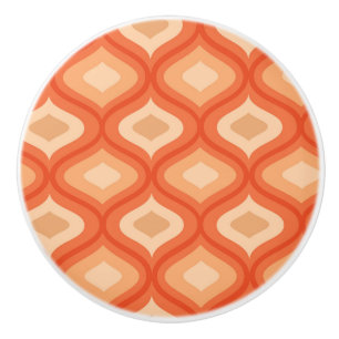 Mid century modern ogee orange and beige ceramic knob