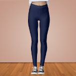 Midnight Navy Blue Solid Color Leggings<br><div class="desc">Discover the elegance of Midnight Navy Blue,  a captivating deep navy blue that evokes the serene mystery of a midnight sky and the profound depths of the ocean. This sophisticated hue brings a touch of enigma and tranquility,  Perfect for adding a subtle yet impactful statement,  this color seamlessly integrates into both modern and classic aesthetics. Elevate your space with the timeless allure of this rich,  dark shade.</div>