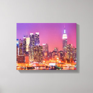 Midtown Manhattan at night with Empire Stae Canvas Print