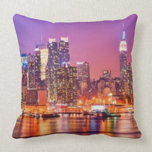 Midtown Manhattan at night with Empire Stae Throw Pillow