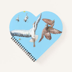 Migratory birds tracing their flights heart shaped notebook