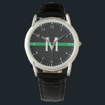 Military Thin Green Line Monogrammed Initial Watch<br><div class="desc">This watch features a thin green line design. It has a horizontal green stripe on a black background across the centre of the watch and a monogram initial in white typography for you to personalize. It also has white clock numbers and ticks for seconds and hours. Makes a unique personalize...</div>