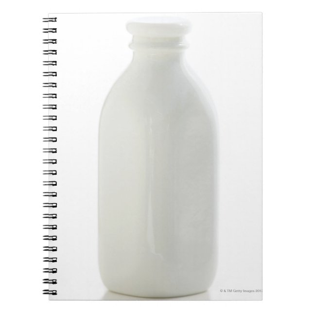 Milk bottle on white background notebook (Front)