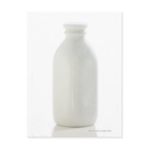 Milk bottle on white background