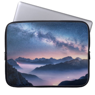 Milky Way over mountains in fog at night in summer Laptop Sleeve