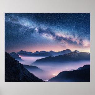 Milky Way over mountains in fog at night in summer Poster