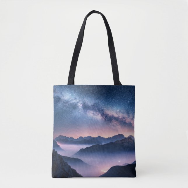 Milky Way over mountains in fog at night in summer Tote Bag (Front)