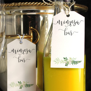 Mimosa étiquettes bouteille avec un bouquet verdoy