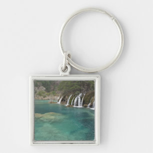 Mineral deposits make waterfalls and clear keychain