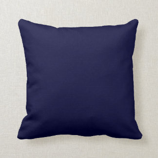 mini voiliers blancs sur coussin bleu marine
