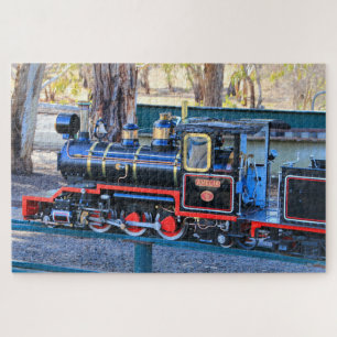 Miniature black steam train engine  jigsaw puzzle