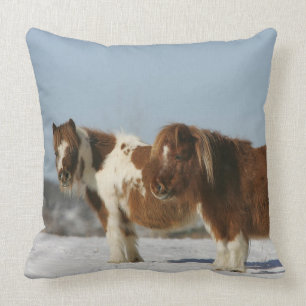 Miniature Horses Standing in the Snow Throw Pillow